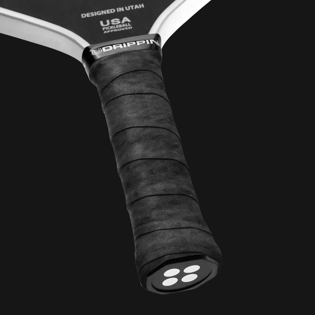black pickleball grip on paddle handle dry overgrip