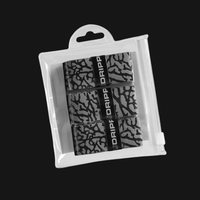 pickleball paddle handle wrapped with grey patterned grip