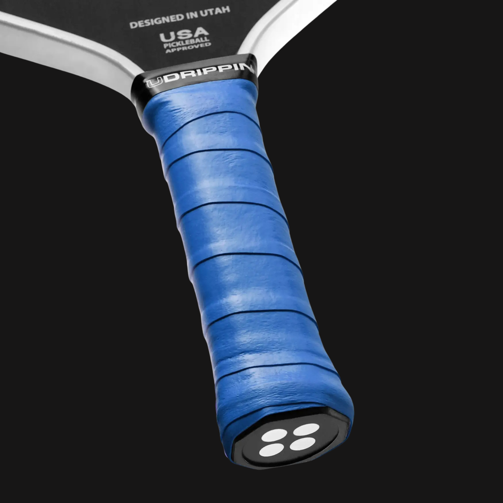 light blue pickleball grip on paddle handle pro tour overgrip