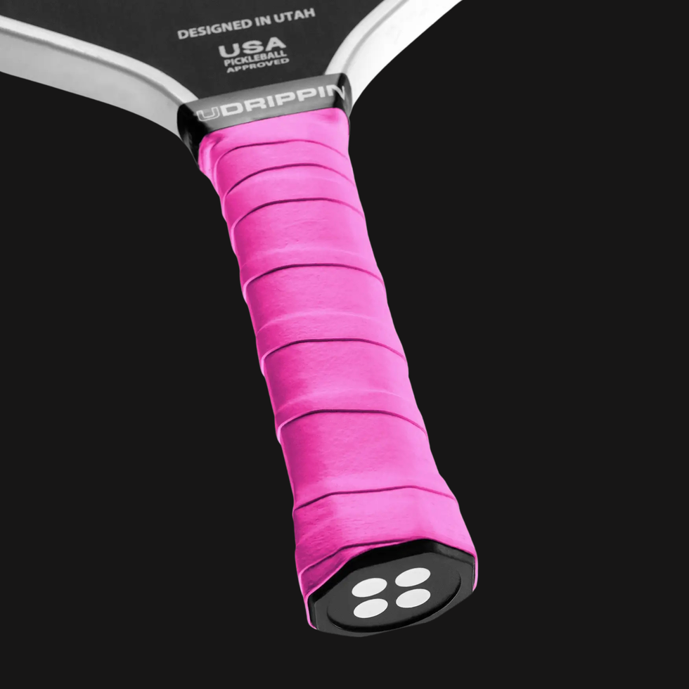 neon pink pickleball grip on paddle handle comfort overgrip