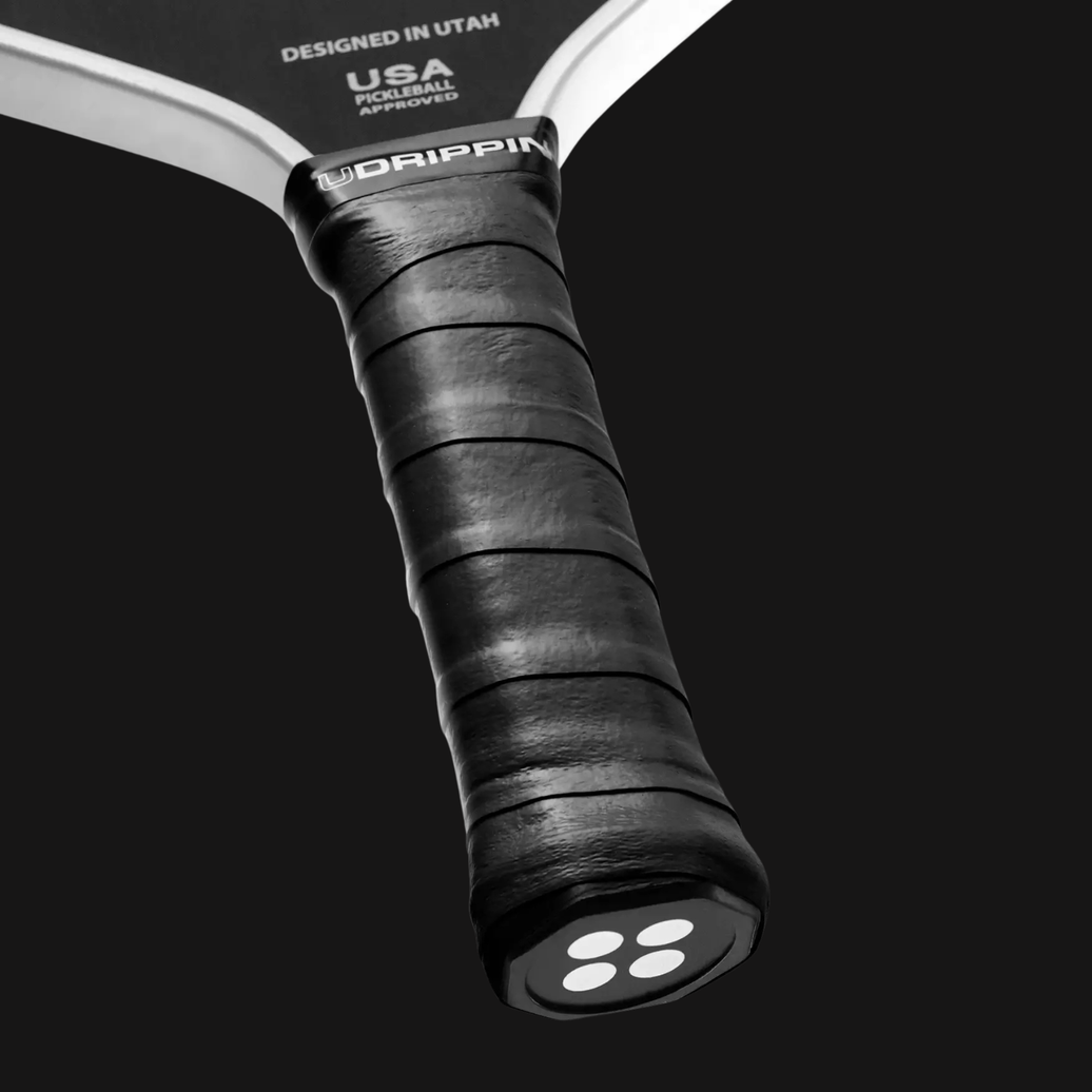 black pickleball grip on paddle handle pro tour overgrip