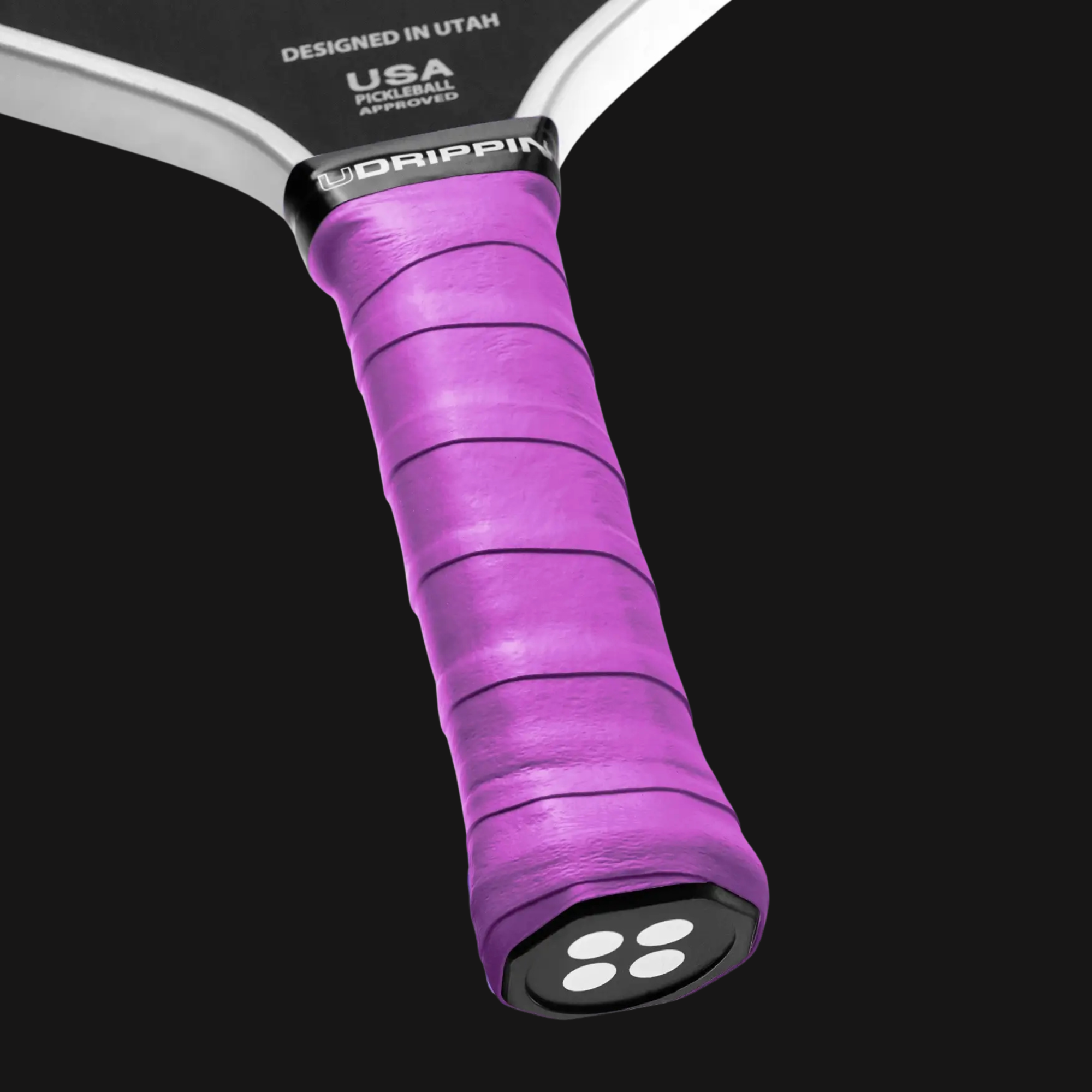 purple pickleball grip wrapped on paddle handle